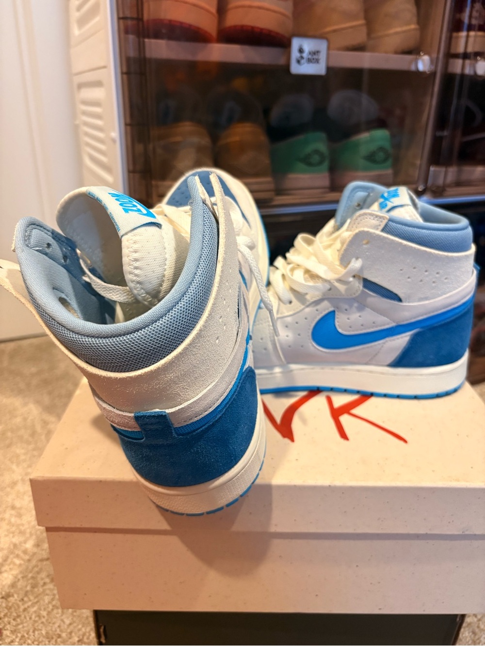 Jordan Men’s High-Top Sneakers in White & Light Blue